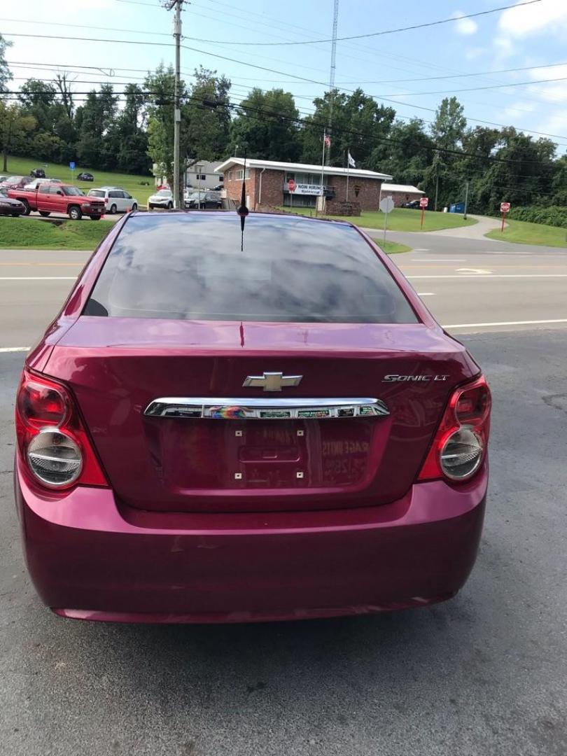 2014 PINK CHEVROLET SONIC LT AUTO (1G1JC5SH9E4) with an 1.8L engine, Automatic transmission, located at 3338 US Rt. 60 East, Huntington, WV, 25705, (304) 733-9888, 38.411072, -82.379471 - Photo#4