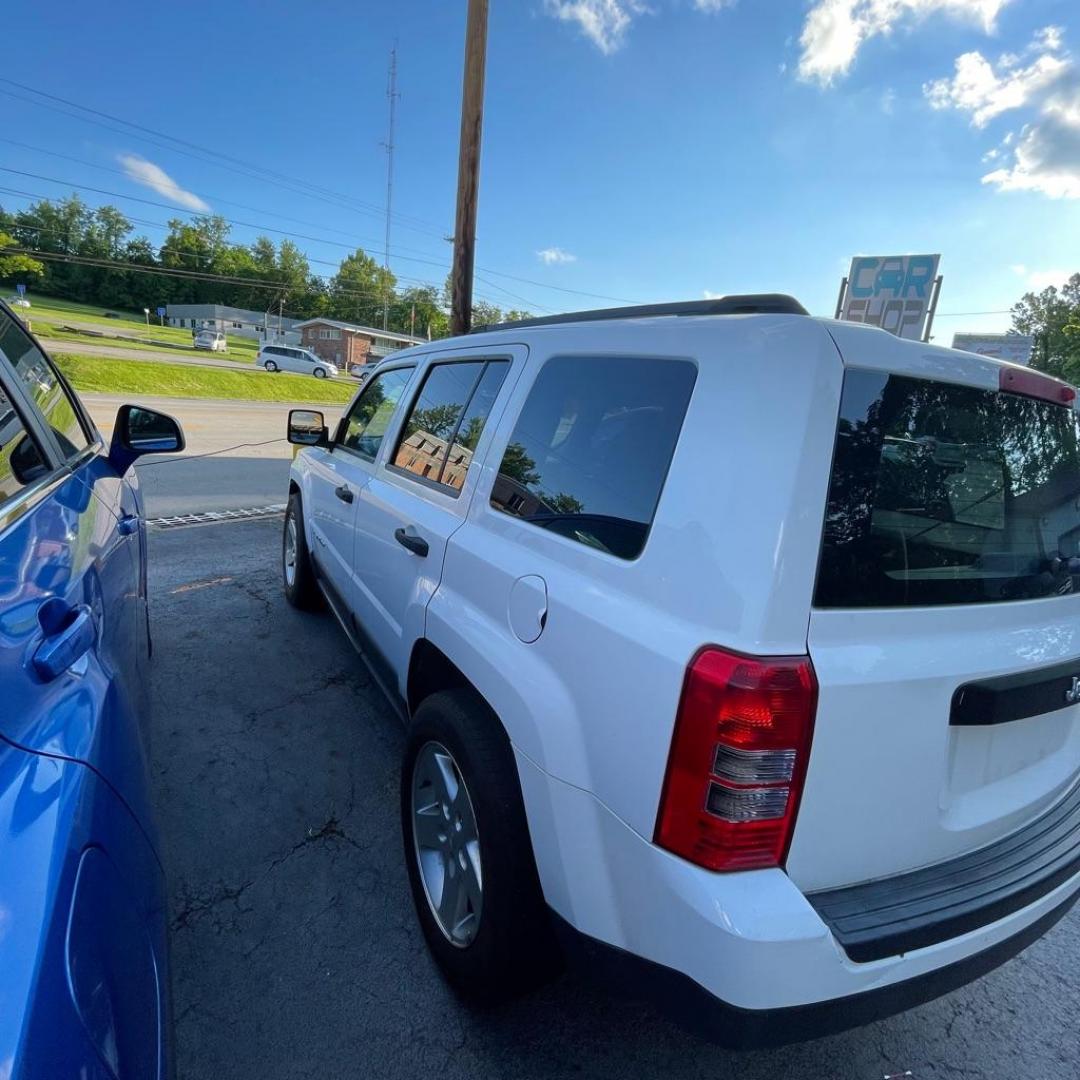 2012 WHITE JEEP PATRIOT SPORT (1C4NJPBA5CD) with an 2.0L engine, Continuously Variable transmission, located at 3338 US Rt. 60 East, Huntington, WV, 25705, (304) 733-9888, 38.411072, -82.379471 - Photo#2