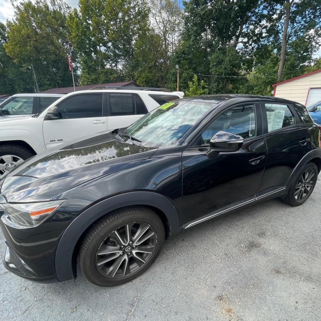 2017 BLACK MAZDA CX-3 GRAND TOURING (JM1DKFD71H0) with an 2.0L engine, Automatic transmission, located at 3338 US Rt. 60 East, Huntington, WV, 25705, (304) 733-9888, 38.411072, -82.379471 - Photo#2